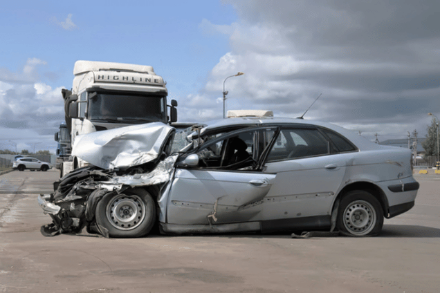 Truck hits car